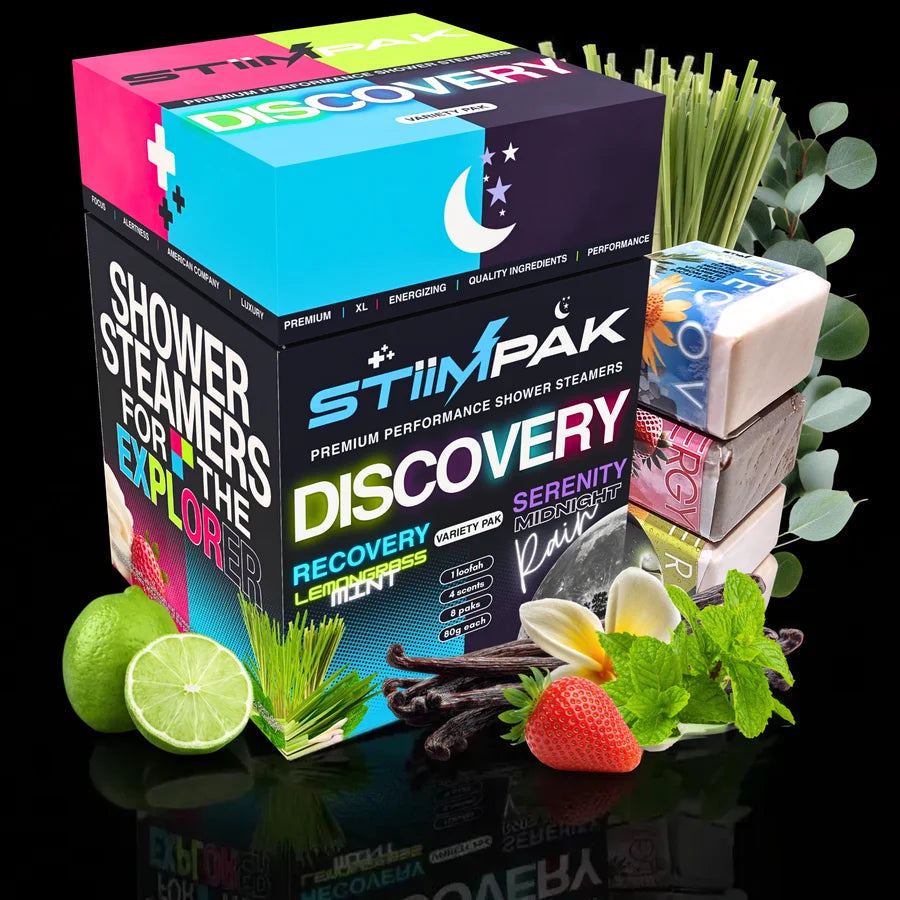 Discovery Variety Pack shower steamers packaging with various scents and ingredients on a reflective surface.