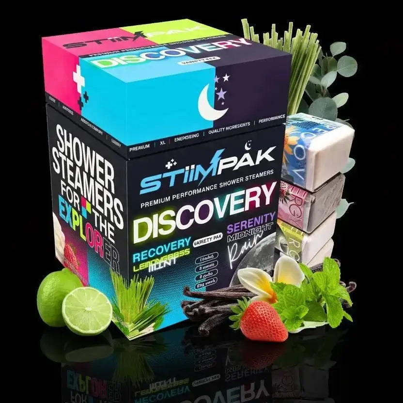 Discovery Variety Pack shower steamers packaging with various scents and ingredients on a reflective surface.