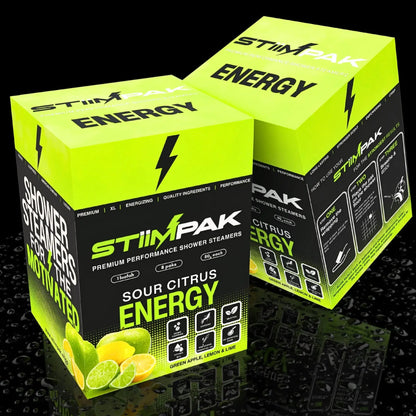 Two boxes of StiimPak Sour Citrus Energy shower steamers, showing front/back on a black background