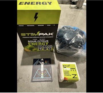 STiiMPAK Energy shower steamer, box, loofah, and intensity card