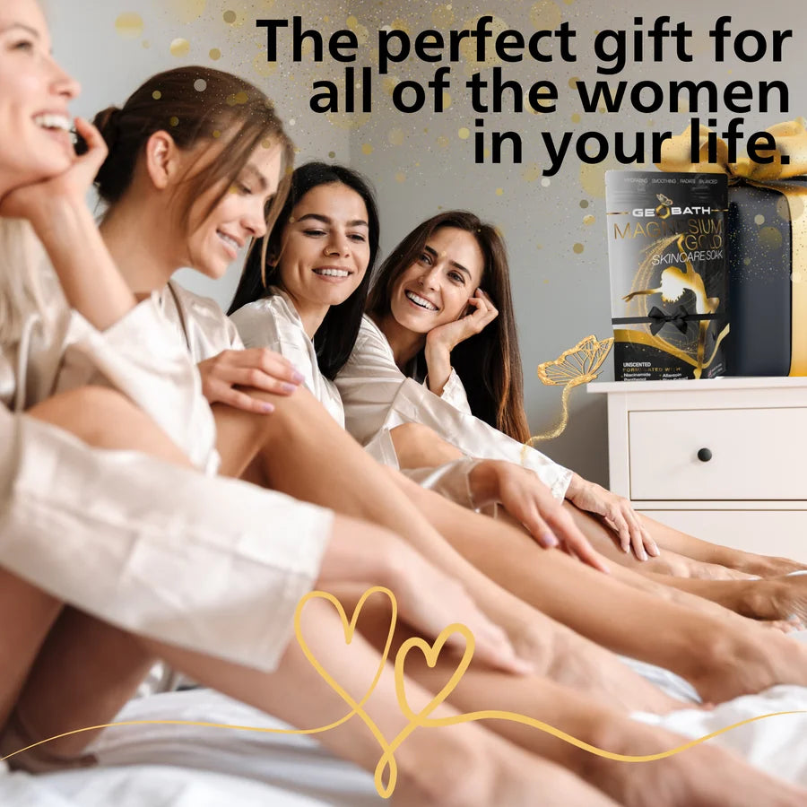 Four women sitting together with Magnesium Gold packaging in the background.