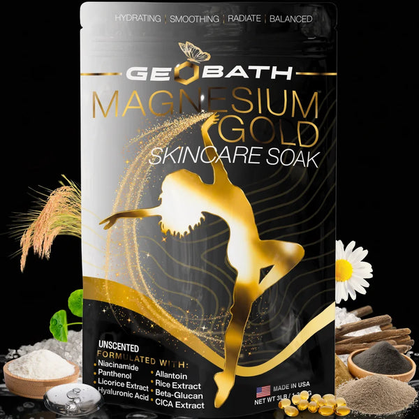 Magnesium Gold bath soak packaging with ingredients on a reflective surface