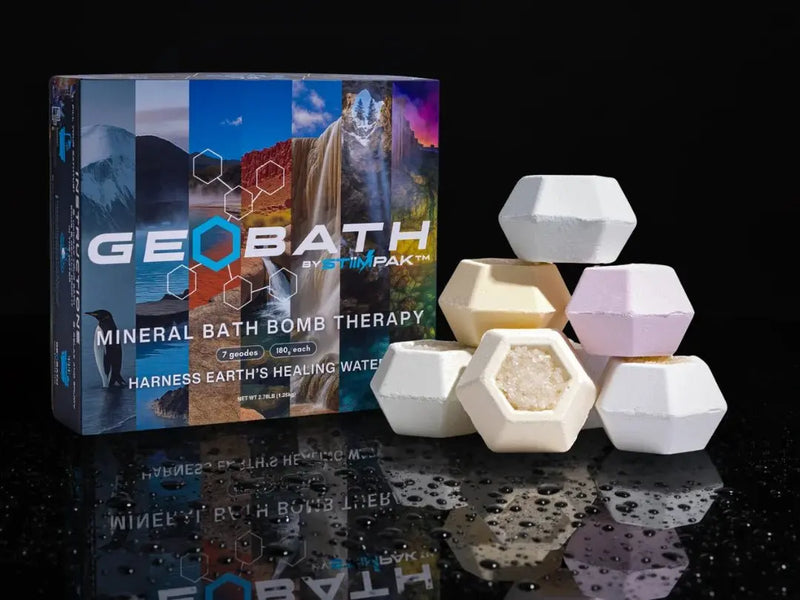 Geobath mineral bath bomb therapy packaging with hexagonal bath bombs on a reflective surface.