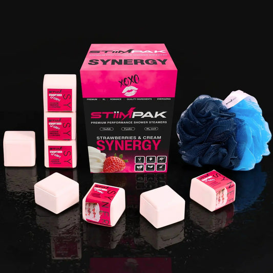 StiimPak Synergy strawberry and cream shower steamers with packaging on a dark background
