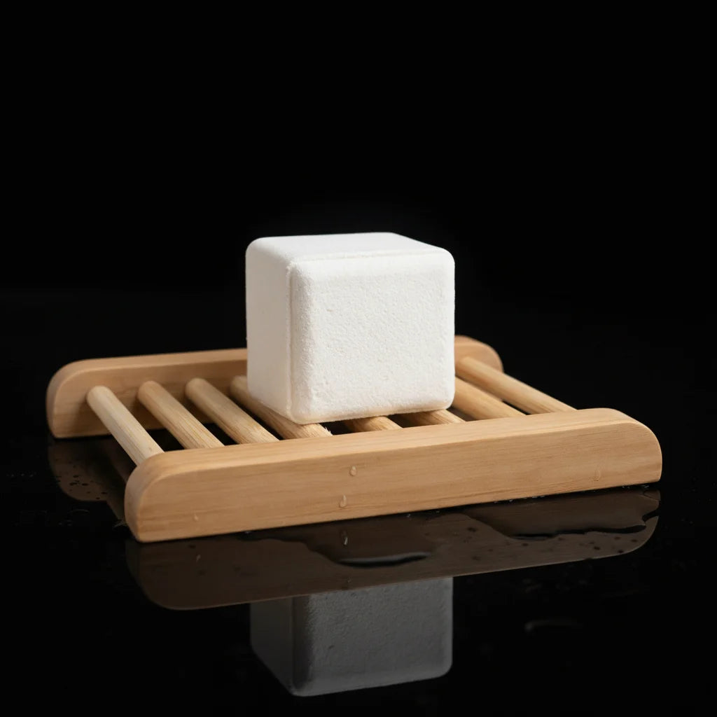 Shower steamer sitting on top of bamboo tray